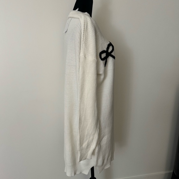 Dreamers by debut knit sweater dress with black bow detail. Size medium. - Picture 3 of 5